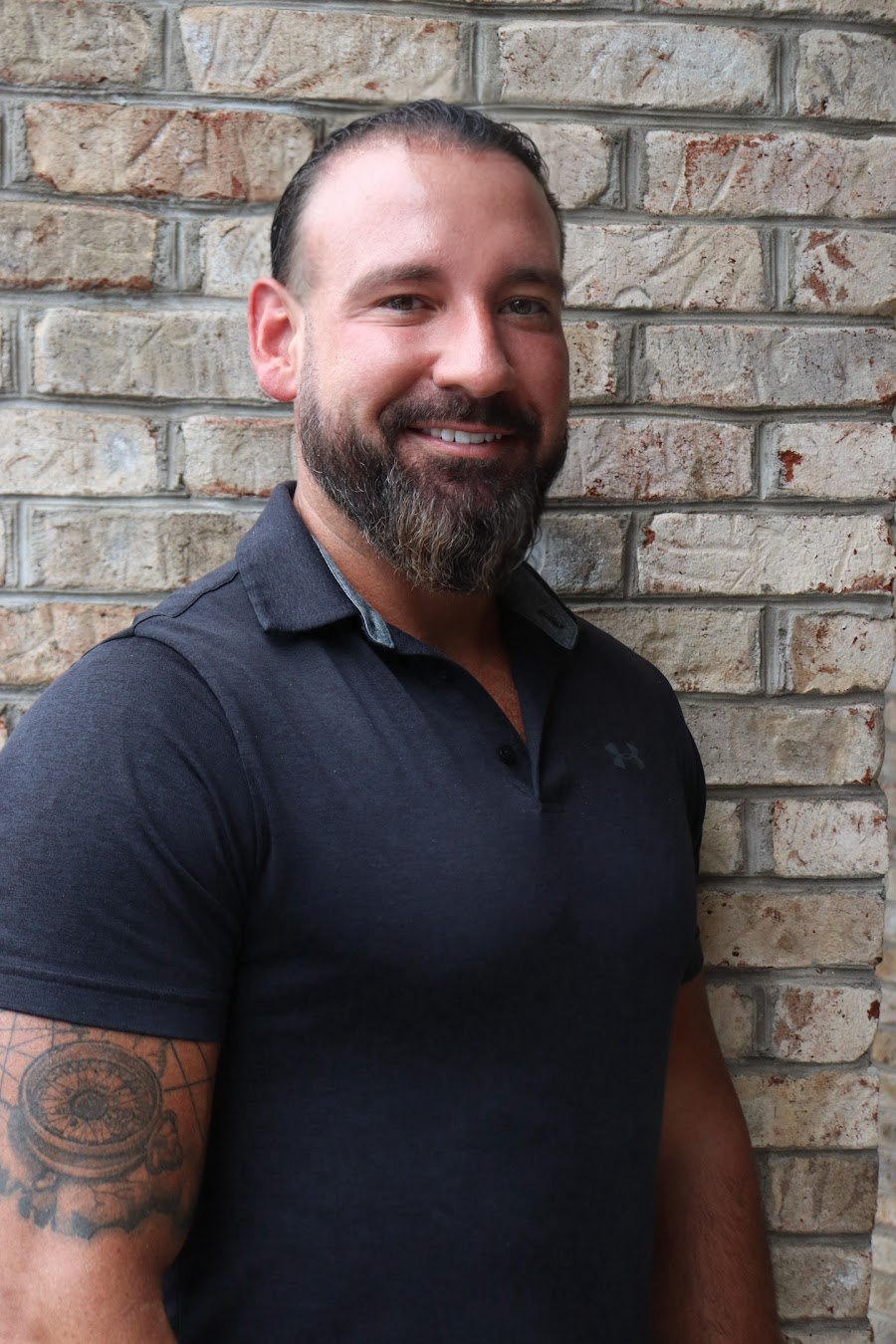 Headshot of Eddie Hughes, FNP-BC, board-certified family nurse practitioner at Peak Performance in Johnson City, TN